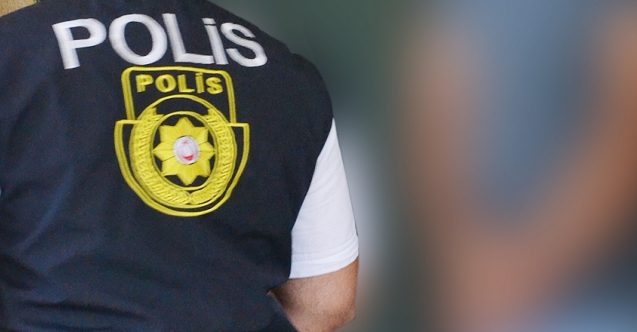 Apartman içerisinde tespit edilen zanlı, kaçmasını engellemeye çalışan 2 kişiyi darp etti
